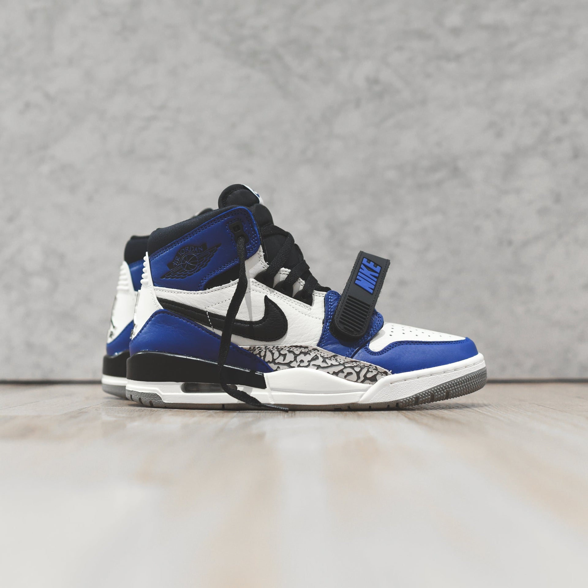 Nike Air Jordan Legacy 312 - Sail / Black / Storm Blue