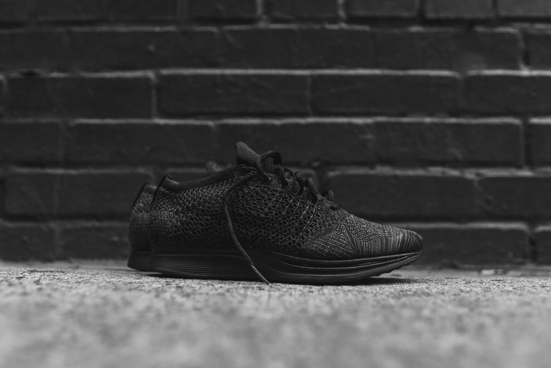 Nike Flyknit Racer - Triple Black