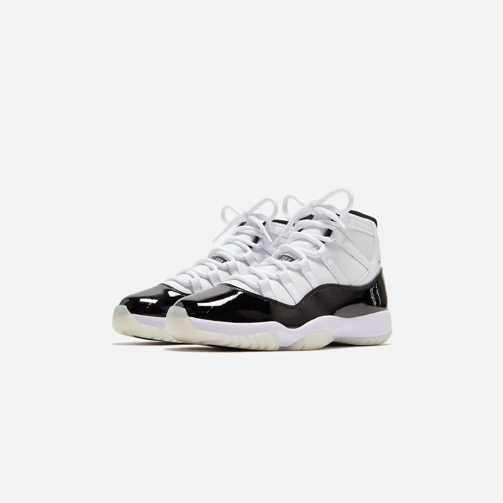 Nike Air Jordan 11 Retro - White / Black / Metallic Gold