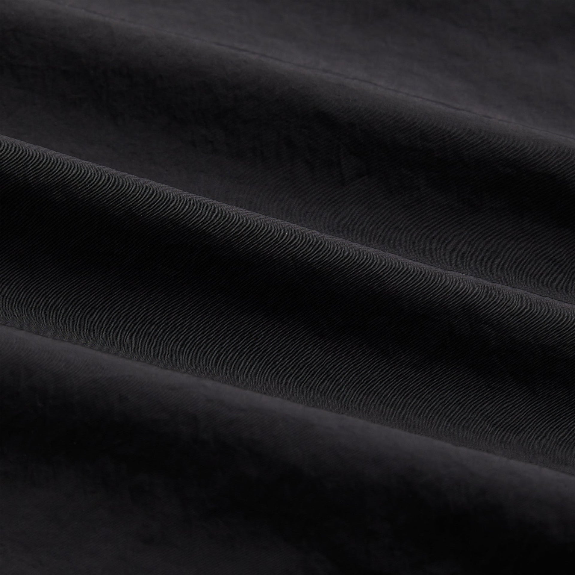 Kith Wrinkle Nylon Windsor Panelled Track Jacket in Black