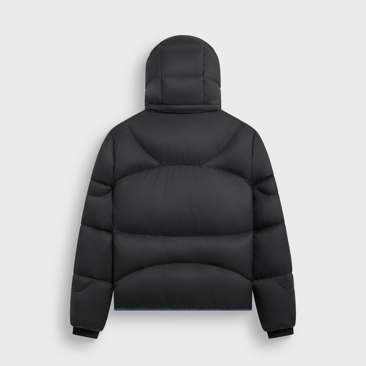 Kith Matte Stretch Taffeta Corey Puffer in black with blue zip, back view, with hood