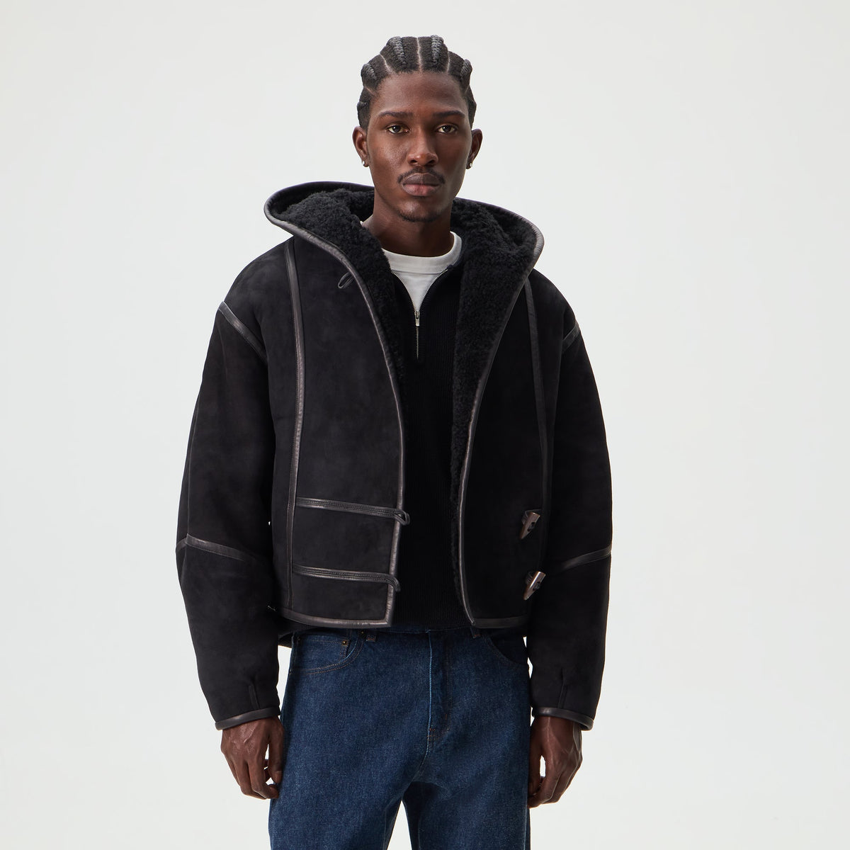 Man wearing black &Kin Shearling Rio hooded suede jacket, front view