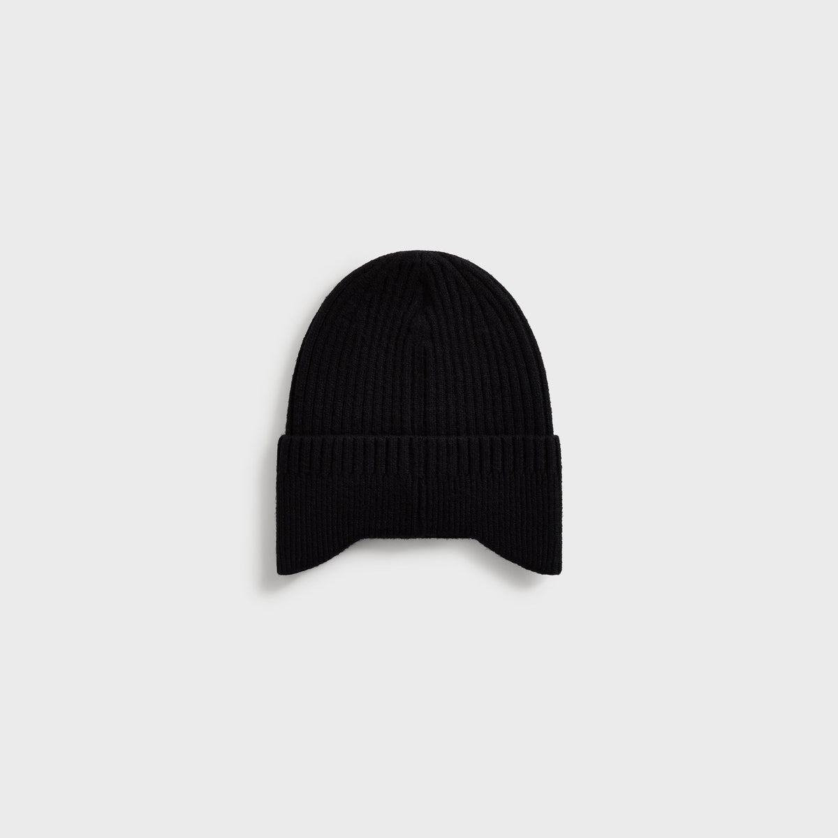 Kith Chunky Knit Earflap Beanie in black, back view, with ear flaps
