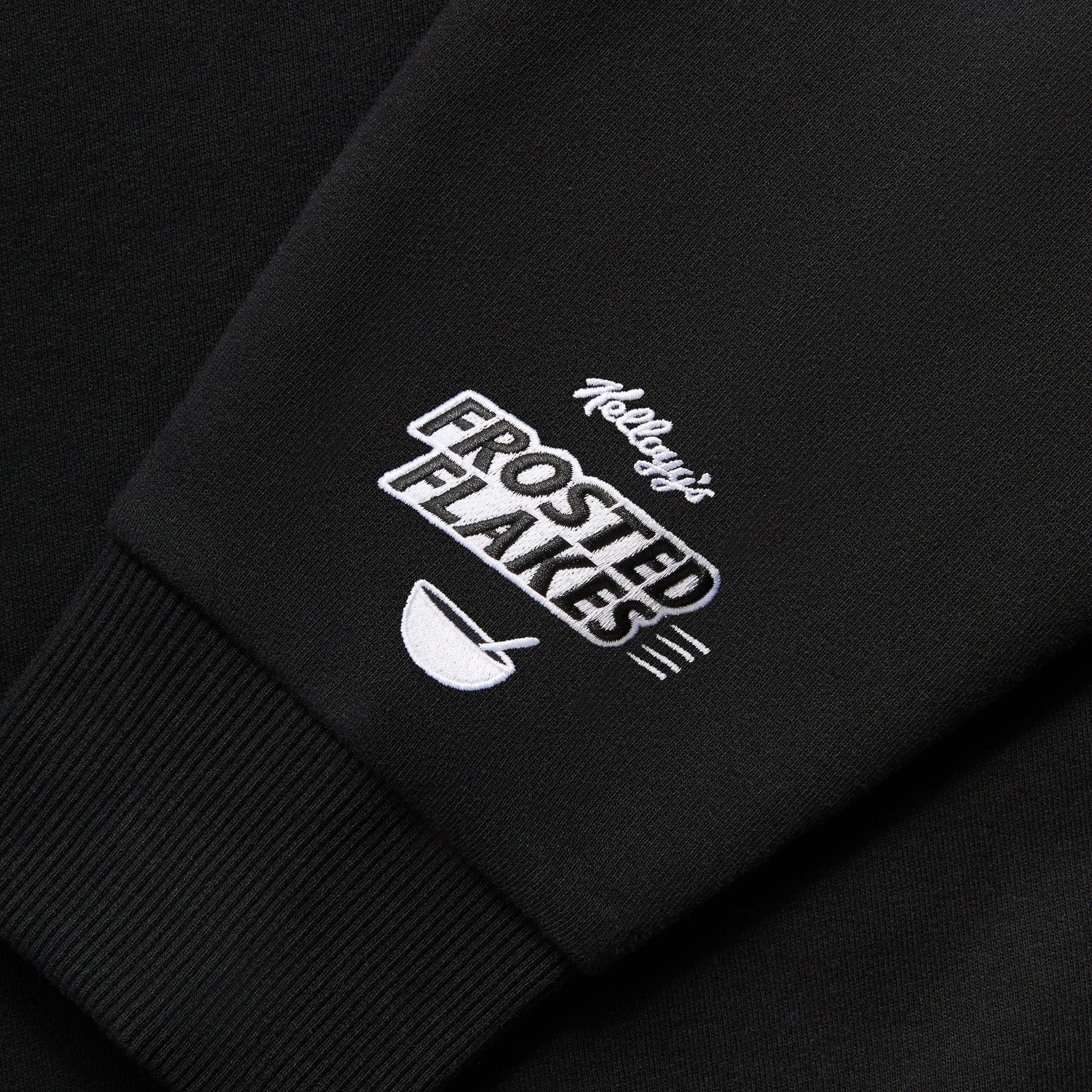 Kith Treats for Kellogg’s Frosted Flakes® Cereal & Tony the Tiger® Classic Logo Nelson Crewneck - Black