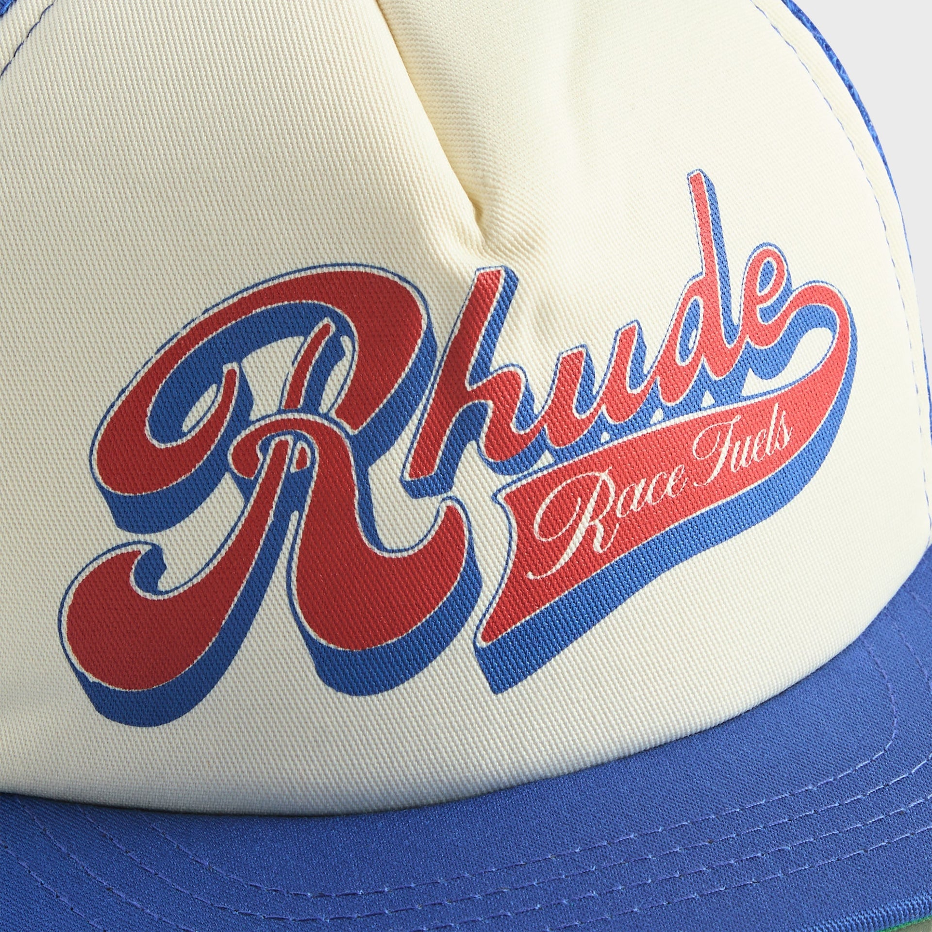 Rhude Pit Stop Trucker Hat - White / Blue / Red