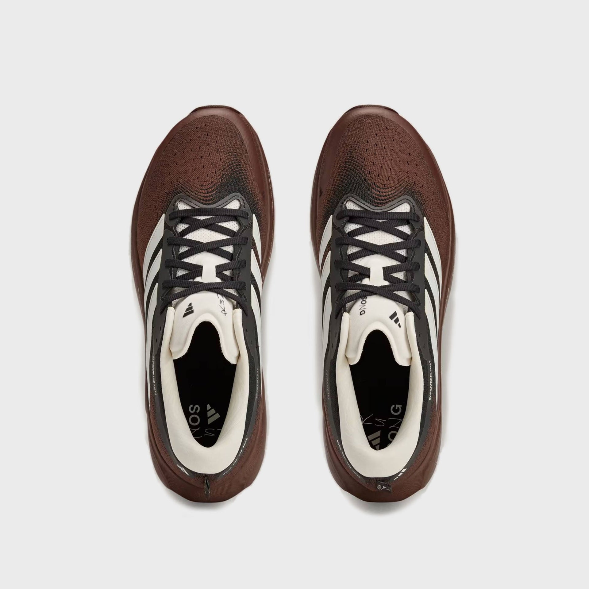 adidas x Song For The Mute WMNS Supernova Rise 3 - Auburn / Chalk White / Core Black